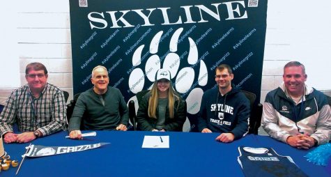 Student signing with MSU
